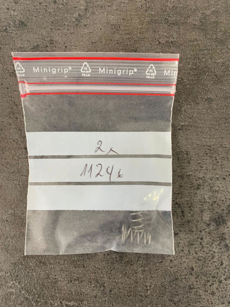 Spring for battery holder